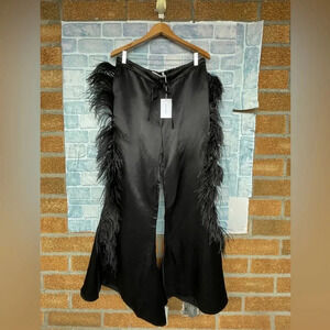 MARQUES' ALMEIDA
Feather-embellished kick-flare satin trousers size 10